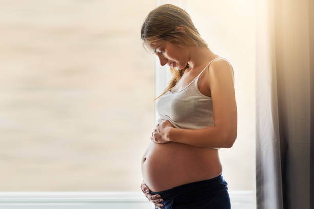 istock Mommy can't wait to meet you 1291738606