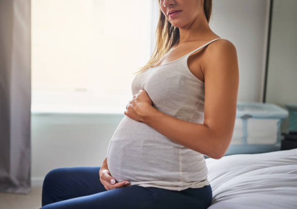 istock I like to show off my beautiful bump 1291738625