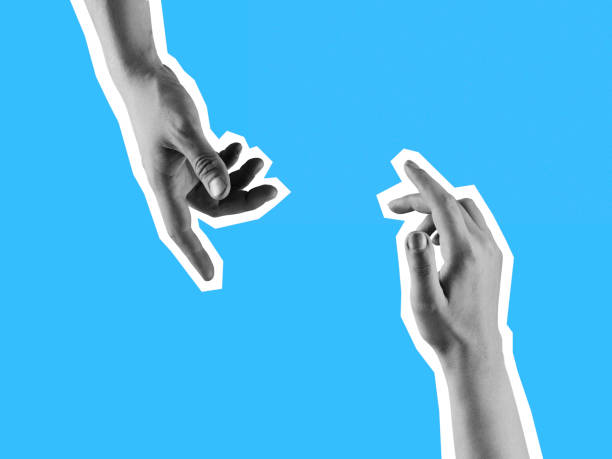 istock Two hands reaching out towards each other isolated on blue background. 1291738835