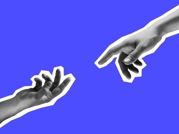 istock Two hands reaching out towards each other isolated on purple background. 1291738868