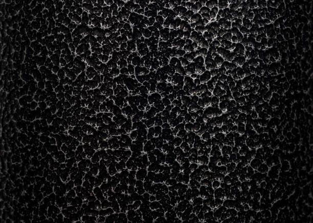 istock Uneven metallic dark background with grungy amazing texture 1291743623