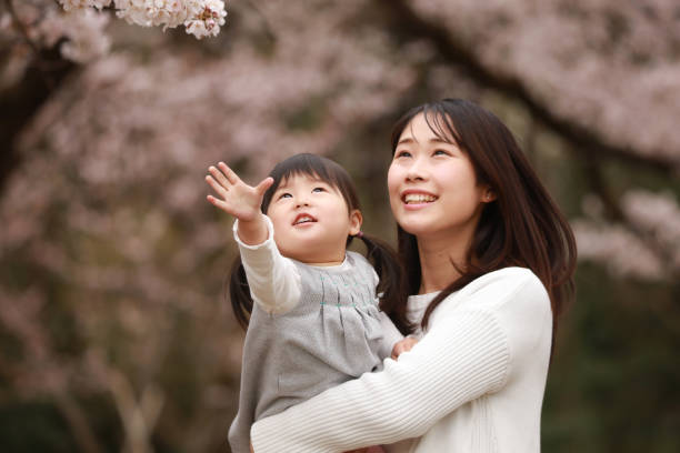 istock Image of smiling parents and children 1291746938