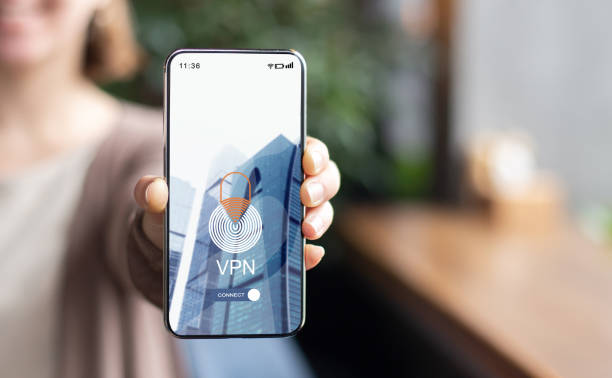 istock Personal Data Protection. Woman Demonstrating Smartphone With Opened Vpn App On Screen 1291747537