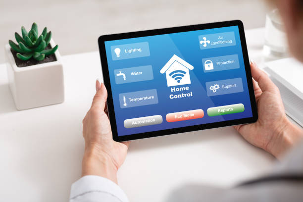 istock Smart House Control. Unrecognizable Woman Using Digital Tablet With Home Automation System 1291747831