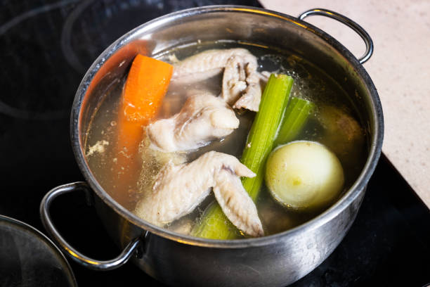 istock chicken wings soup is cooked in steel stewpot 1291751419