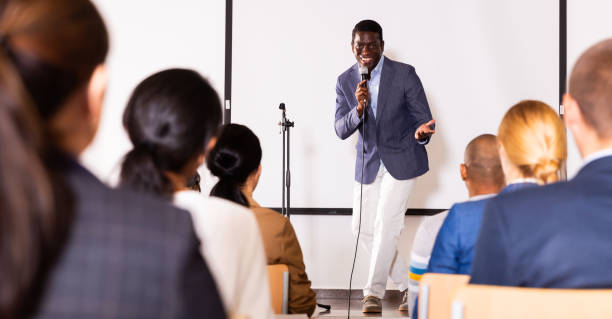 istock Young emotional male coach giving motivational speech 1291753607