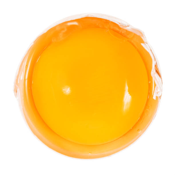 istock top view of separated egg yolk in half of shell 1291753865