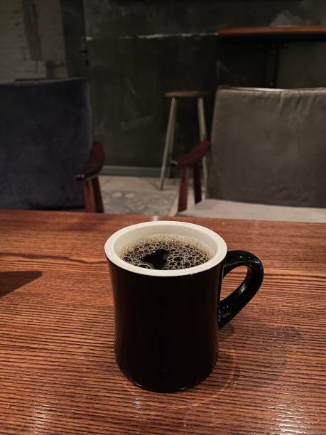 black cup of black coffee