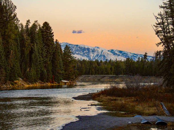 istock Teton Mountains and Snake River Sunrise 1291753973