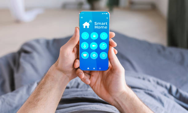 istock Collage of young guy using smart home automation control system, choosing among options on cellphone screen 1291754187