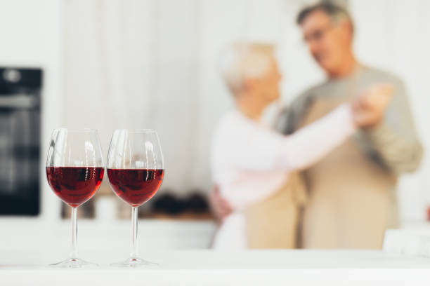 istock Unrecognizable Senior Couple Dancing Having Romantic Date At Home 1291754219
