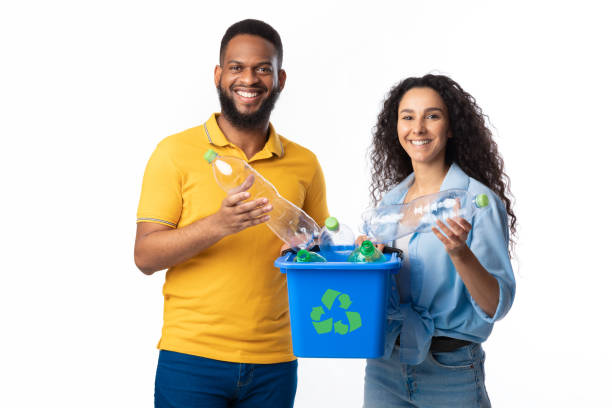 Diverse Couple Holding Box For Recycling Plastic Bottles, White Background
