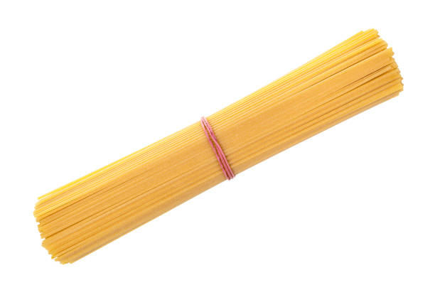 istock bunch of italian dried spaghetti isolated on white 1291756475