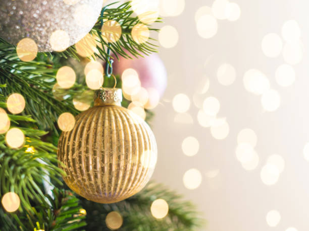 istock New year christmas tree background with ornaments 1291756630