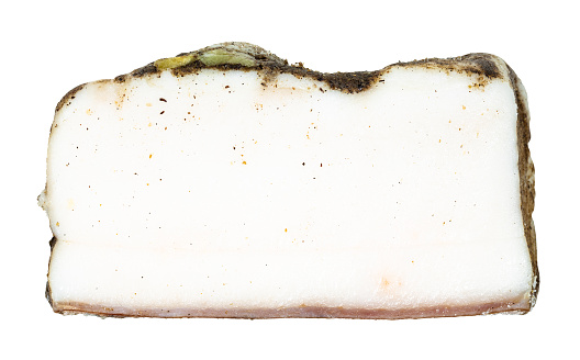 slice of Salo (salted pork fatback) with garlic and black pepper isolated on white background