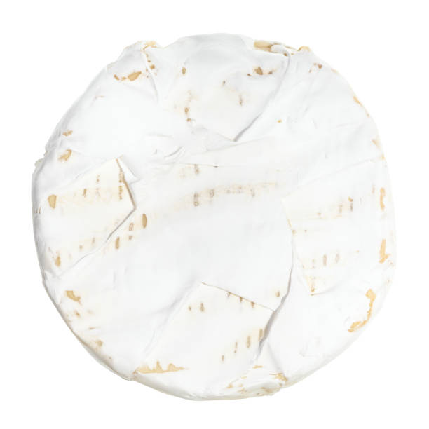 istock top view of soft cheese with white mold isolated 1291757821