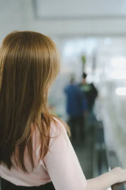 Photo of Rear View Of Woman Sitting In Hair