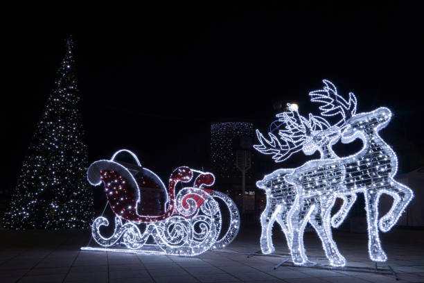 Sleighs and reindeer decorated with ice lamps