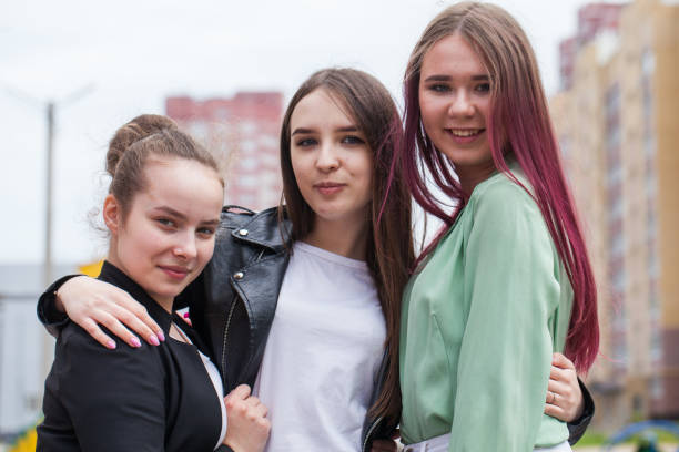 istock fun group of three teenagers 1291763734