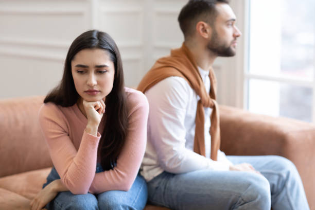 istock Offended Arab Couple Not Talking After Quarrel Sitting At Home 1291765320