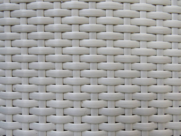 istock White wicker woven texture. Close up white bamboo mat as striped background. Oriental artificial rattan pattern. 1291767789