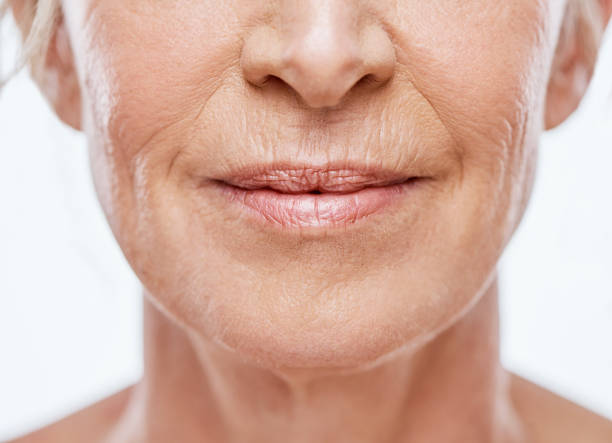 My wrinkles is a sign of my wisdom Cropped shot of a mature woman's mouth wrinkled stock pictures, royalty-free photos & images