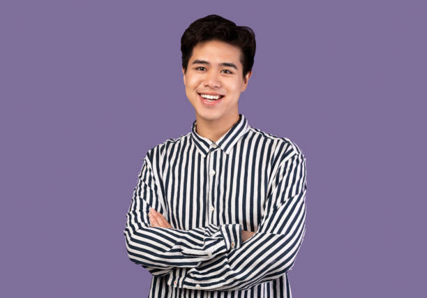 istock Portrait of attractive asian guy posing at studio 1291771000
