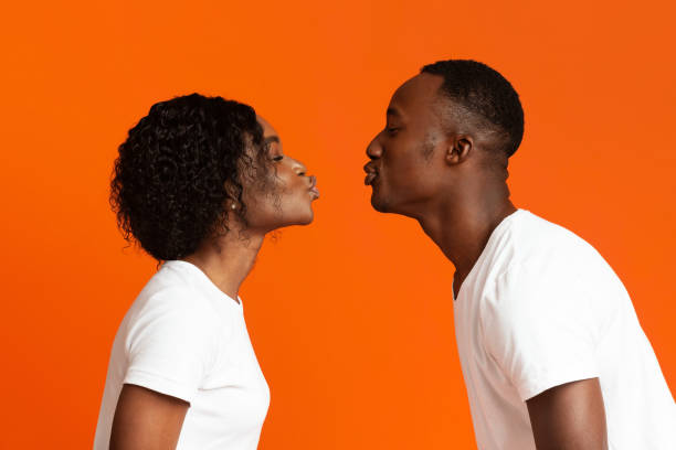 istock Black man and woman drawn to each other 1291771480