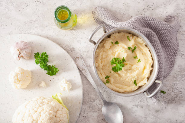 istock mashed cauliflower with butter. ketogenic paleo diet side dish 1291772007