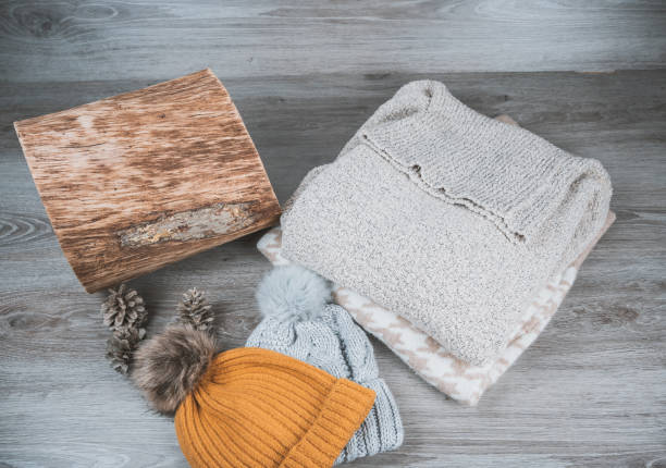 istock Yellow golden wool sweaters and beanies 1291772899