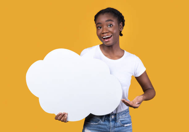 istock Black Young Lady Showing Blank Thought Bubble Yellow Background 1291773182