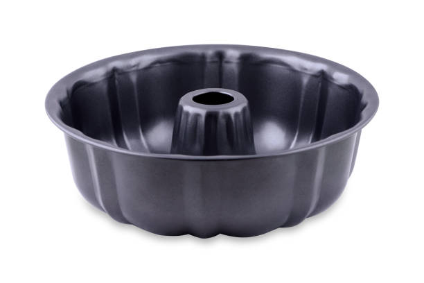 Cake form isolated on white background, copy space. Cake cup, metal mold, bakeware.