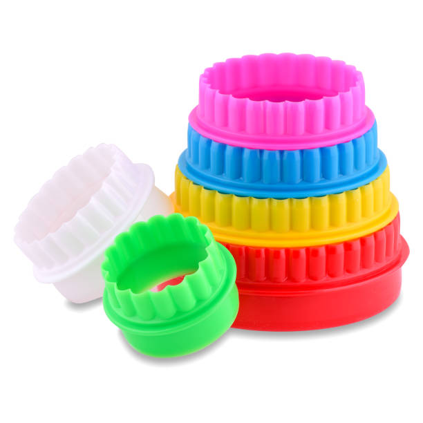 istock Colorful cookie cutters isolated on white background, copy space. Plastic mold 1291774402