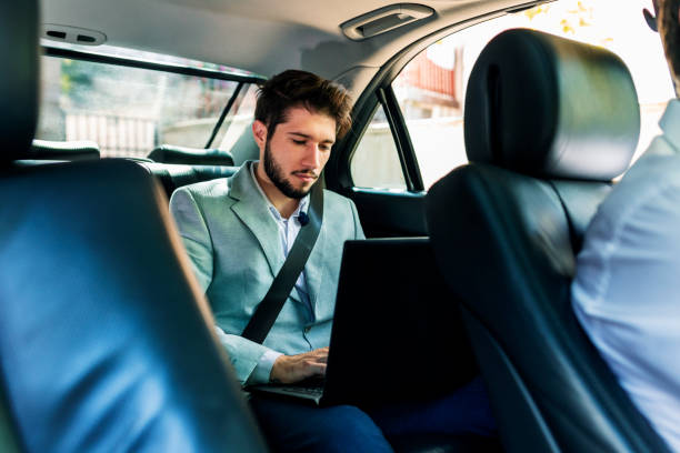 istock Young businessman at car 1291777343