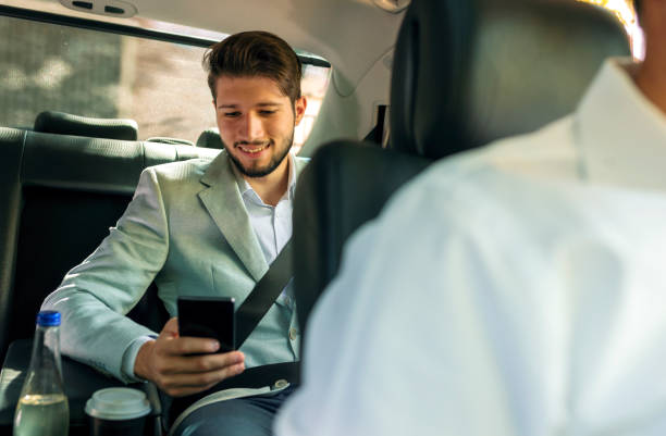 istock Young businessman at car 1291777382