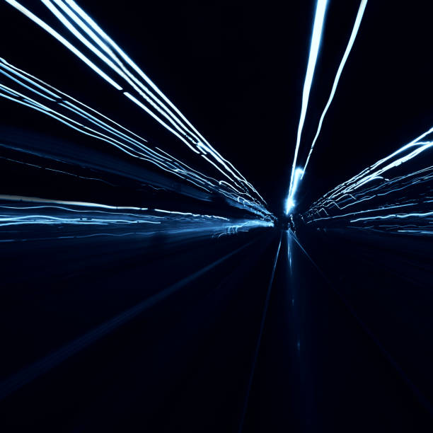 istock Abstract long exposure blurred city lights 1291779293