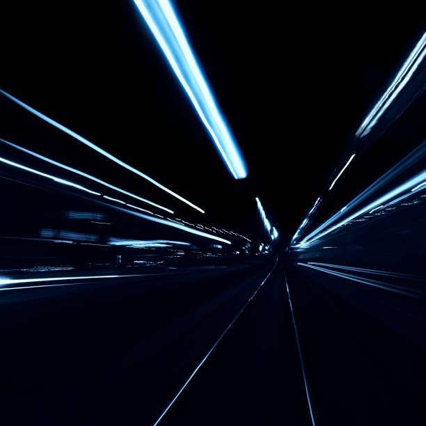 istock Abstract long exposure blurred city lights 1291779303