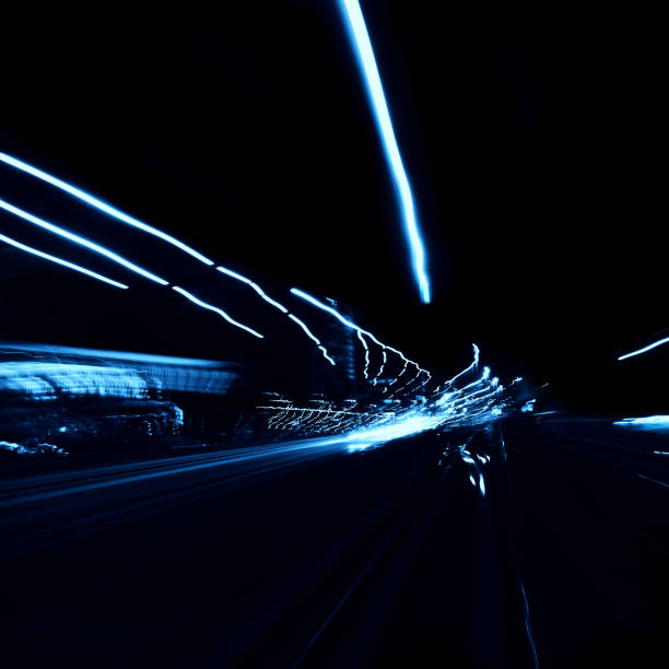 istock Abstract long exposure blurred city lights 1291779313