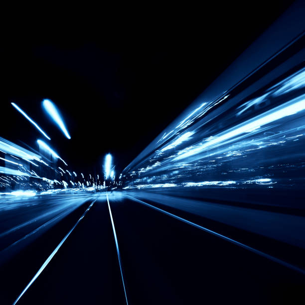 istock Abstract long exposure blurred city lights 1291779317