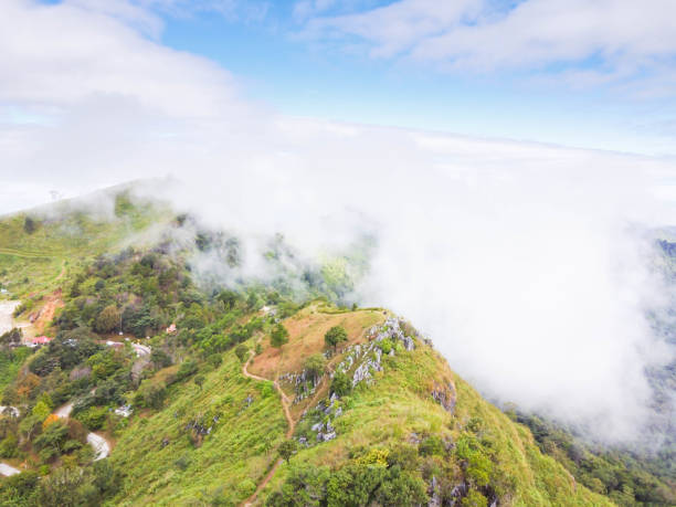 istock Beautiful green mountains and white clouds in the sky. 1291781611