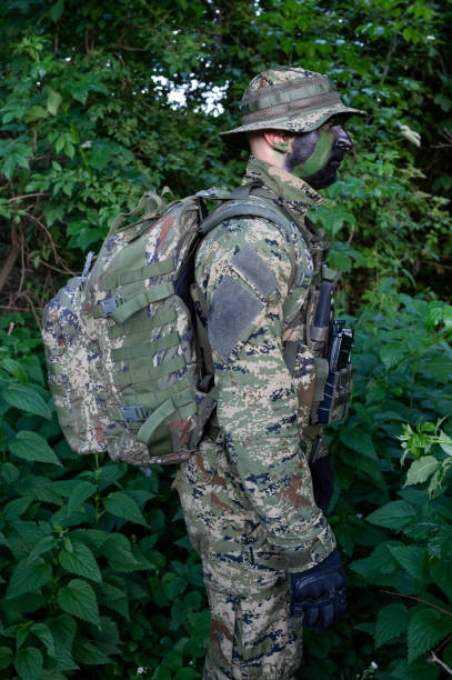 istock Recon unit soldier in his forest camoflauge 1291781933