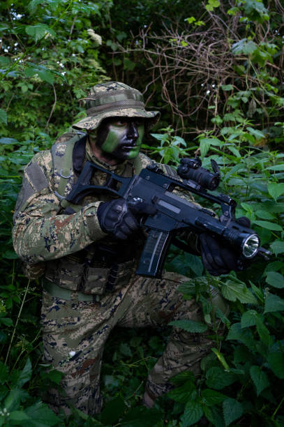 istock Recon unit soldier in his forest camoflauge 1291781964