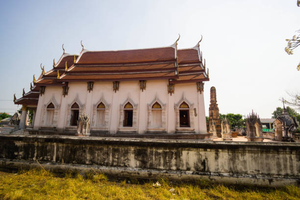 istock Beautiful old Buddhist temple in Thailand, blue sky. 1291781999