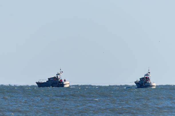 istock US Coast Guard Cutters at Sea 1291783350