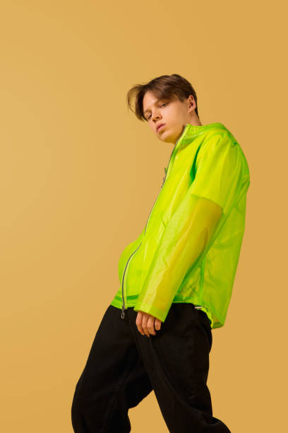 istock Old-school fashioned young man dancing isolated on yellow background 1291789274