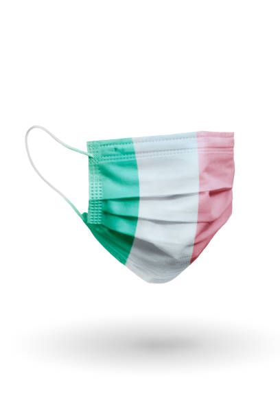 istock Surgical face mask with pattern flag Italy isolated on white background. 1291790637