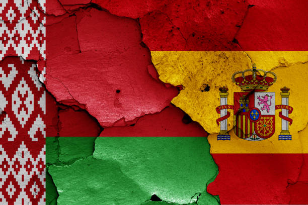 istock flags of Belarus and Spain painted on cracked wall 1291790961
