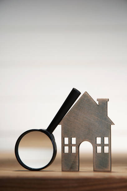 istock House searching concept with a magnifying glass 1291793297