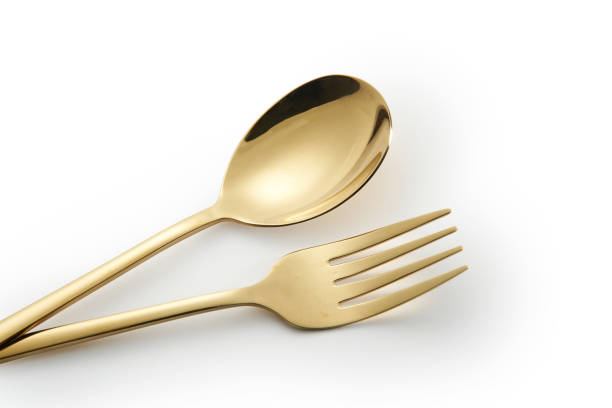 istock Golden spoon and fork isolated on a white background ,clipping path 1291793830