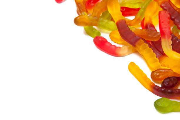 istock Tasty jelly worms isolated on white background. 1291794618